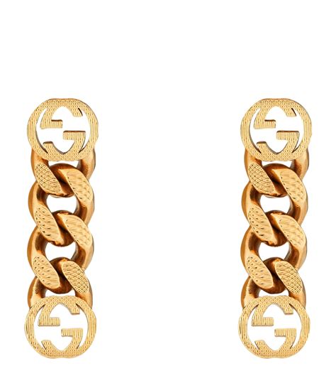 interlocking g earrings gucci gold|Gucci silver dangling earrings.